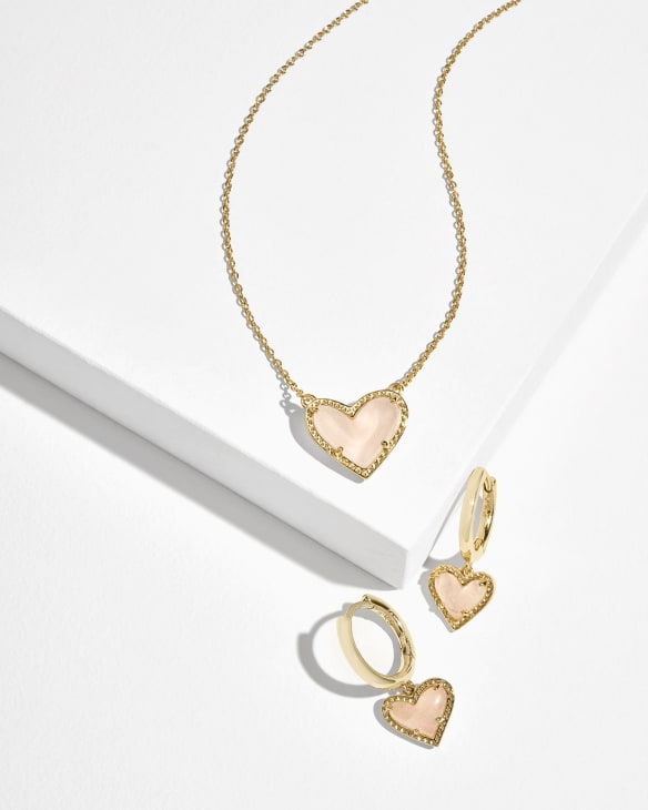 Ari Heart Pendant Necklace in Gold and Ari Heart Huggie Earrings in Gold Set